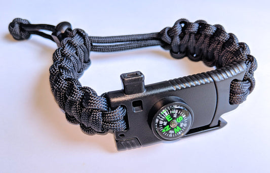 Paracord survival bracelet with tactical buckle adjustable